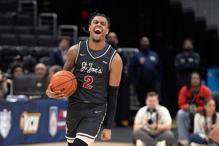 St. Joe's guard Erik Reynolds scored 21 points to lift the Hawks to the A-10 semifinals.