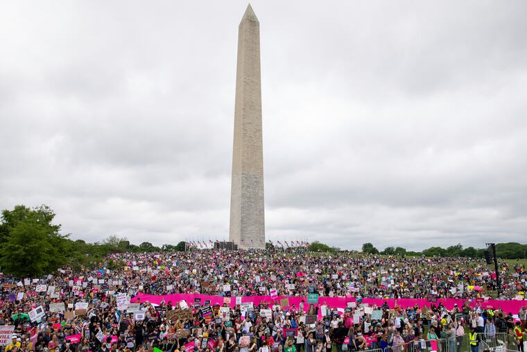 Abortion rights demonstrators rally, on the National Mall in Washington, during protests across the country.