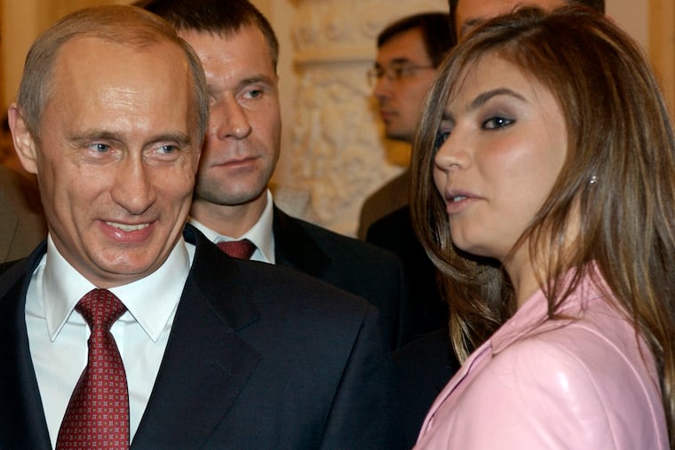 Russian President Vladimir Putin with gymnast Alina Kabaeva in 2004.