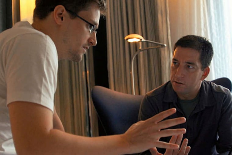 Edward Snowden (left), Glenn Greenwald talking in Hong Kong in "Citizenfour." (Radius Films)