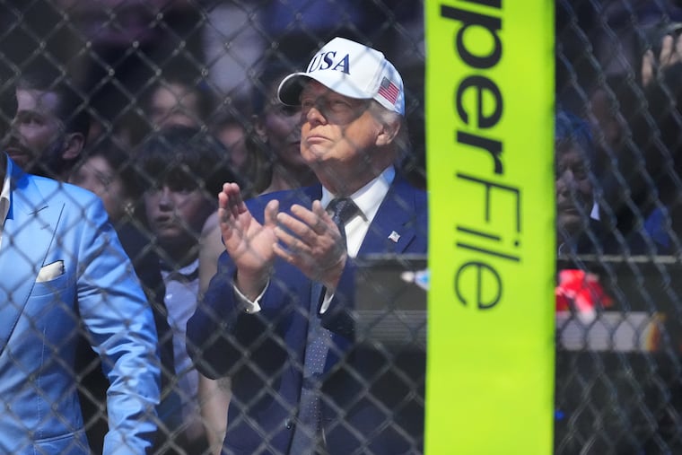 President Donald Trump attends UFC Freedom 250 on the South Lawn of the White House, Monday, June 15, 2026, in Washington. The structures built for the event have now been removed, leaving the South Lawn bare of grass.