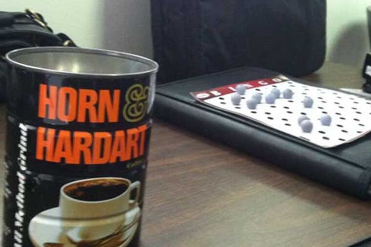 Per a longstanding tradition, 41 Traffic Court candidates picked bingo balls out of a coffee can Wednesday during a City Commission hearing to determine ballot positions. (Daily News File Photo)