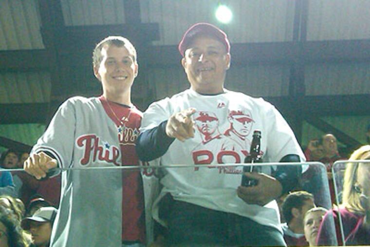 Juan Lopez has raised his son Jonathan in the Philly diehard way: Love your teams and be rude to your enemies. But outside the ballpark in real life, they're both very polite guys.