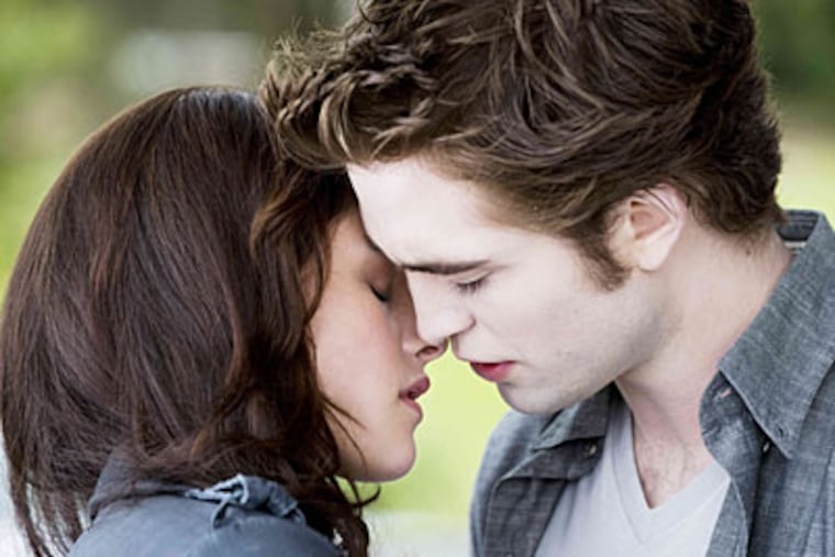Kristen Stewart stars as Bella Swan and Robert Pattinson stars as Edward Cullen in "The Twilight Saga's New Moon."
