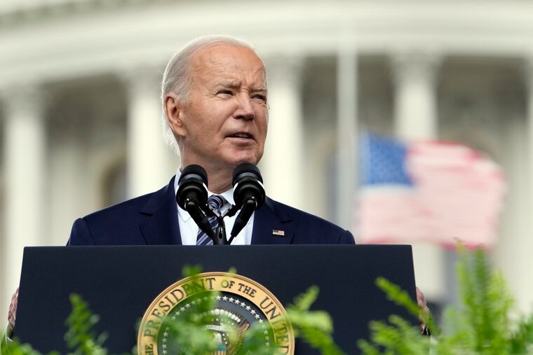 President Joe Biden speaks at a memorial service to honor law enforcement officers who've lost their lives in the past year, during National Police Week ceremonies at the Capitol in Washington on Wednesday.