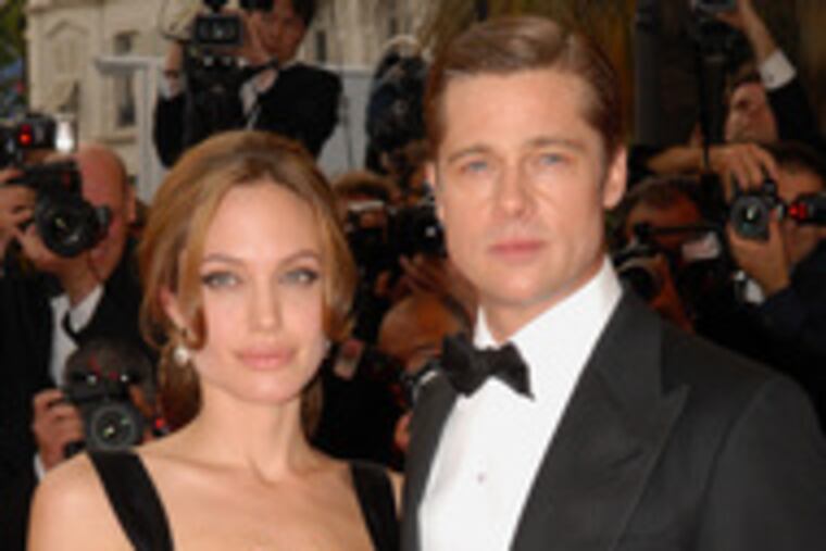 At the screening of "A Mighty Heart" at Cannes this week, Angelina and Brad stroll the red carpet. She plays the wife of a slain journalist.