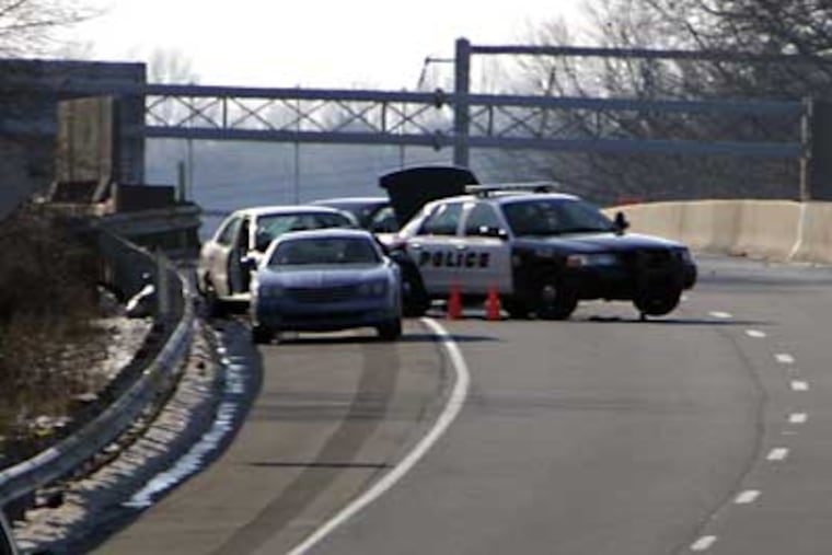 The accident scene on U.S. Route 1 North at the I-95 interchange in Langhorne where Officer Chris Jones was struck and killed during a traffic stop Thursday morning. (Laurence Kesterson / Staff Photographer)