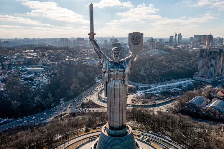 A view of Ukraine's the Motherland Monument in Kyiv Sunday, Feb. 13, 2022. U.S. pension boards are debating how they should respond to the Russian invasion of Ukraine. Should they sell their Russian investments and take big losses or wait for a recovery and then divest? (AP Photo/Efrem Lukatsky, File)
