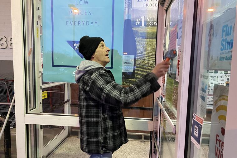 Cleaning windows is not just a job but a source of pride for Joe Heipp