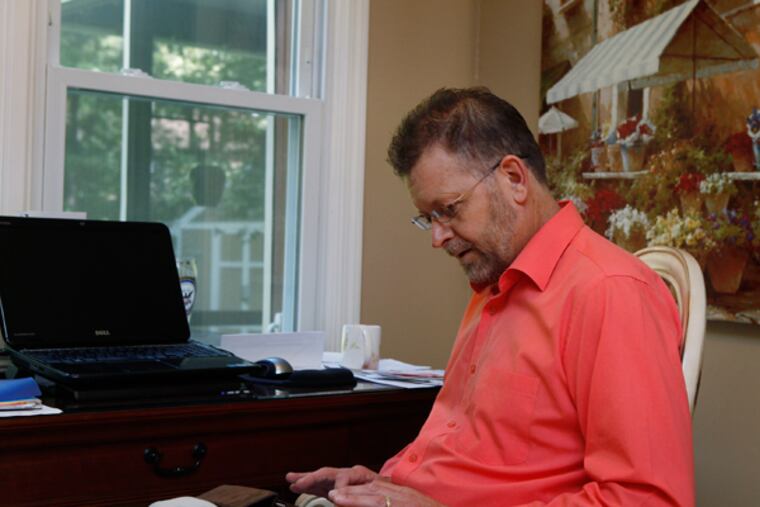James "Randy" Pace prepares for his last council meeting. He will be leaving Medford to join his wife who transferred to new job in Tennessee. (MICHAEL S. WIRTZ/Staff Photographer)
