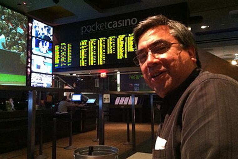 Chris Lindstrom, 48, of Sacramento, Ca., had a front row seat last week to watch the baseball playoffs at Lagasse's Stadium - the sports book at the Venetian Casino Resort in Las Vegas, Nev. He said he would visit Atlantic City if it had sports betting. (Suzette Parmley / Staff)