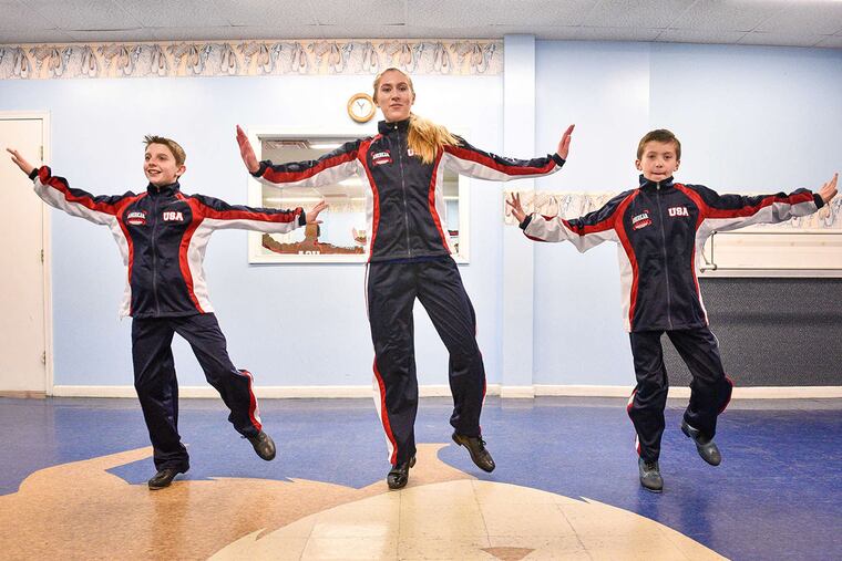 At the Royal Dance Academy in National Park (from left), Christopher Pietrowski, 11; Brianna Daniels, 18; and TJ Koger, 11, practice a tap routine.