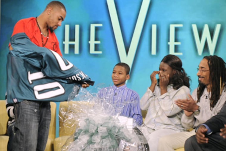 Eagles receiver DeSean Jackson presenting his jersey to Upper Darby bullying victim Nadin Khoury on ABC's "The View" on Feb. 3, 2011.