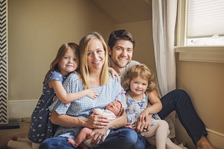 Krista and Ian Koteles with daughters Kora (left), Della and the newest, Jemma, who was born at home in May.