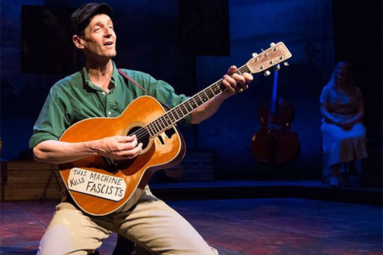 David M. Lutken in "Woody Sez," a look back at the work of folksinger Woody Guthrie. The shows goes on at People's Light & Theater Co. to next Sunday. (Mark Garvin)