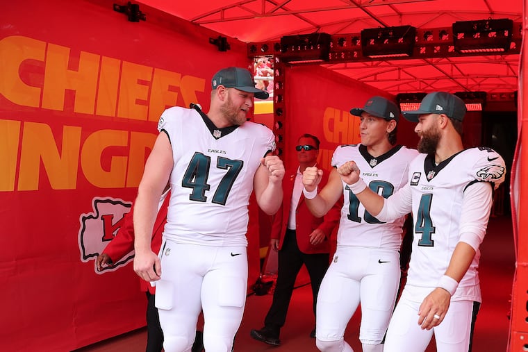 Eagles long snapper Charley Hughlett (left) was placed on injured reserve on Tuesday.
