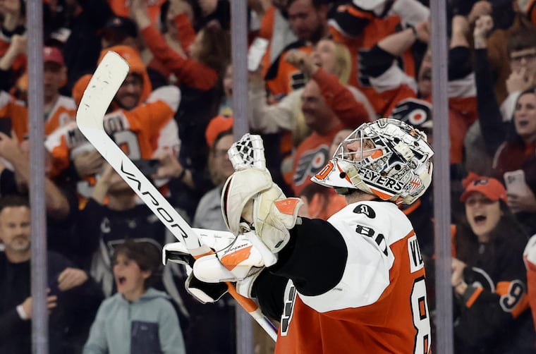Flyers goaltender Dan Vladař celebrates after the Flyers beat the Carolina Hurricanes in a shootout to clinch a postseason berth.