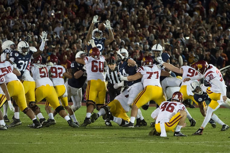 USC kicker Matt Boermeester kicks the game-winning field as time expires in the 103rd Rose Bowl Game January 2, 2017. USC beat Penn State 52-49.