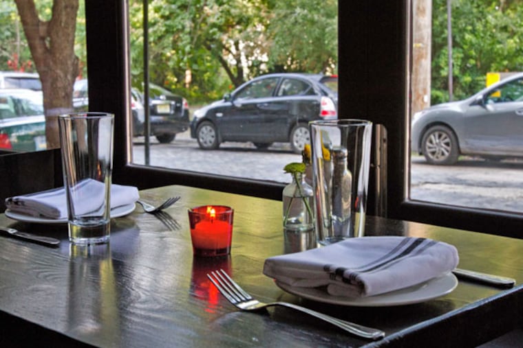 Table setting at window seat on first floor of Jerry's Bar, 129 W Laurel St., Northern Liberties. ( DAVID M WARREN / Staff Photographer )