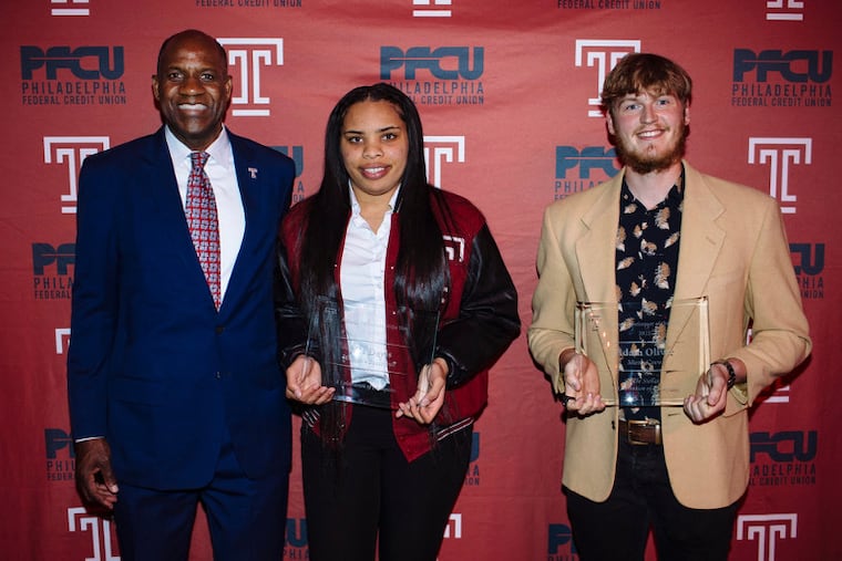 Temple women's basketball star Mia Davis holds her award for best female athlete of the year.