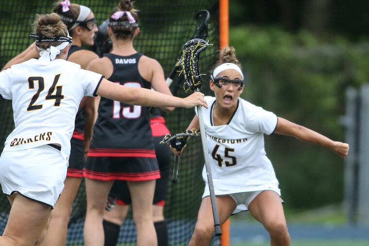Moorestown's Kayla Frank (45) celebrates her goal against Haddonfield with teammate Ashley Nutt (24) during the 1st half of the ToC semifinals on Wednesday.
