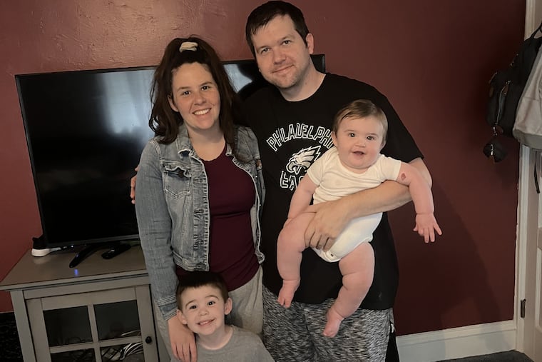Connie and Matt with kids Sammy (left) and Lincoln.