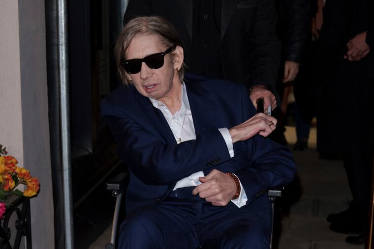 Shane MacGowan poses for photographers upon arrival at the Shane MacGowan, The Eternal Buzz & The Crock of Gold Exhibition in London in 2022.