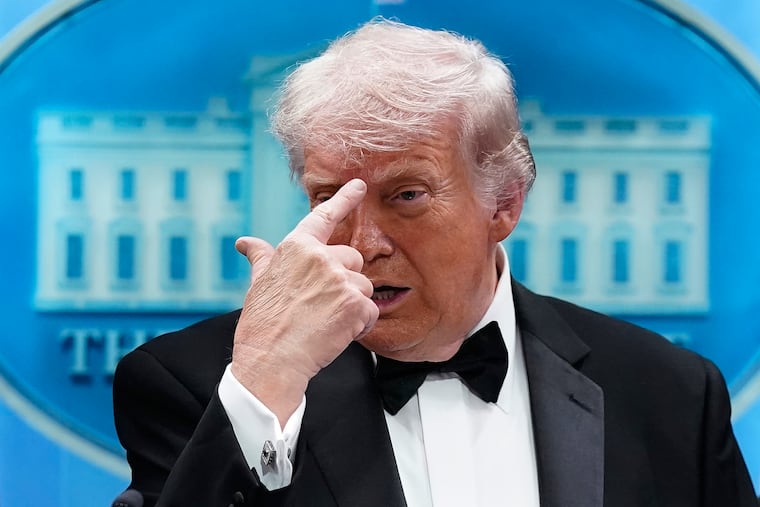 President Donald Trump gestures as he speaks in the James Brady Press Briefing Room at the White House after an allegedly armed man tried to get past security at the annual White House Correspondents' Association Dinner in Washington, Saturday.