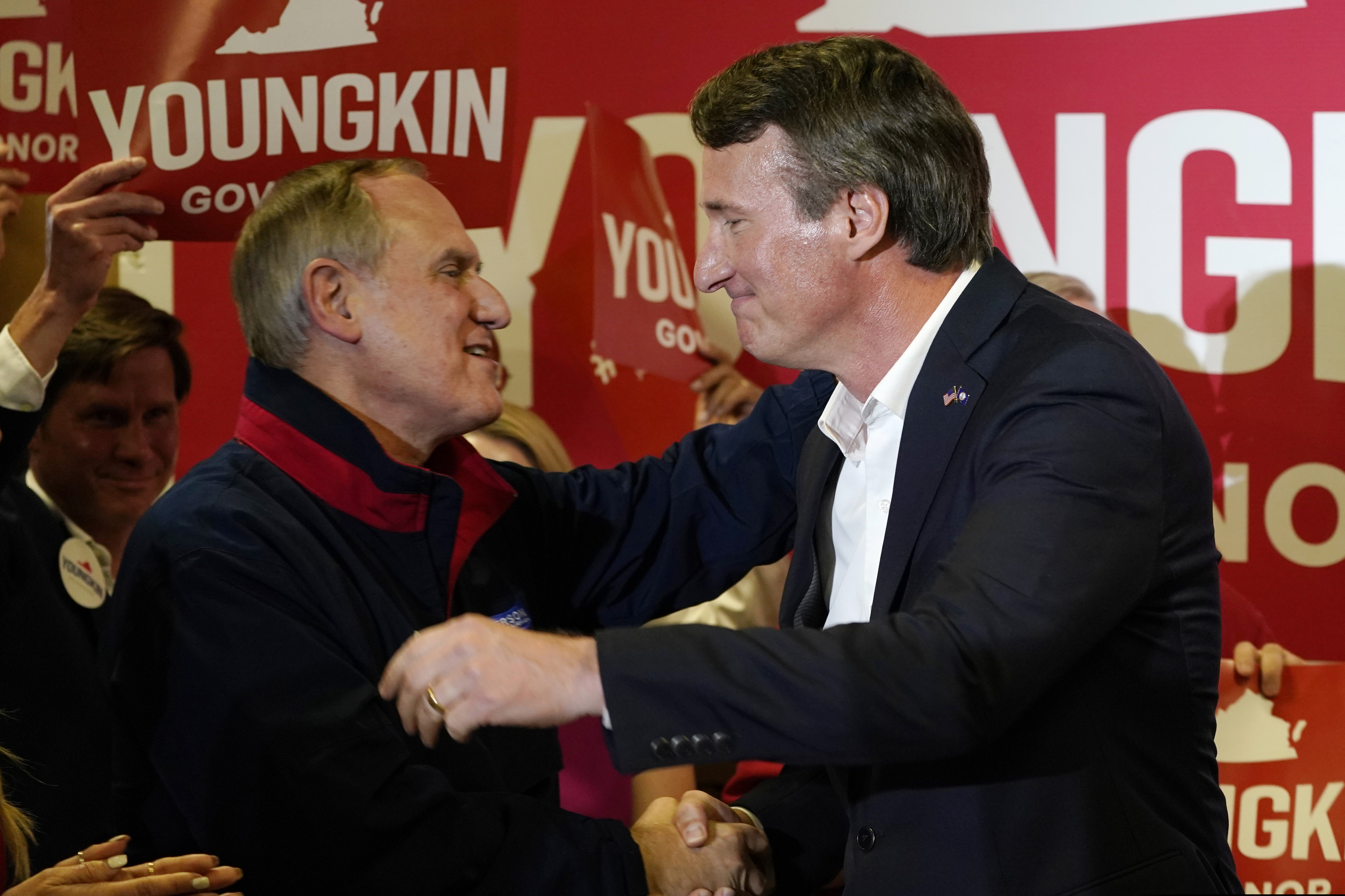 Then-Republican gubernatorial candidate Glenn Youngkin (right) embracing Virginia Republican Party chairman Rich Anderson as he arrived for an event in Richmond, Va., in May 2021.