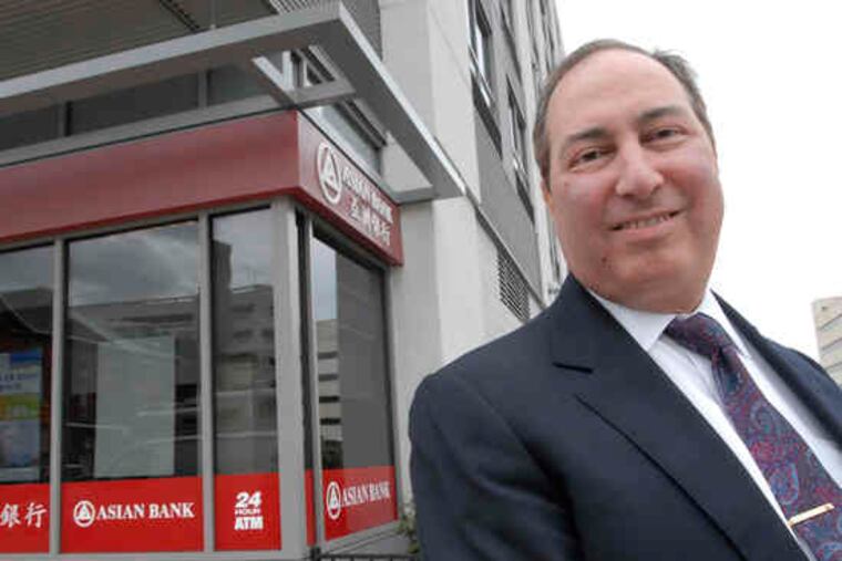 The president of First Trust Asian Bank, Marc Winkler, at the Pearl Condominiums. The bank has moved into one of the Chinatown building's 10 commercial suites.