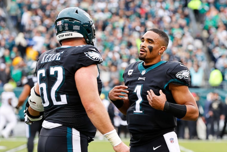 Eagles quarterback Jalen Hurts with center Jason Kelce against the New Orleans Saints last month.