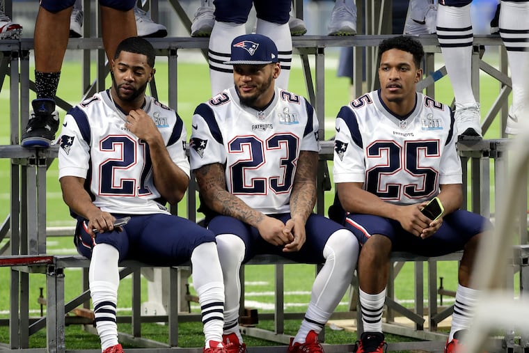 Former New England Patriots cornerback Malcolm Butler (left) was a starter for his team but was mysteriously benched during the Patriots' Super Bowl LII loss to the Eagles.