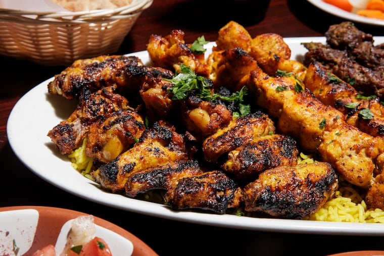 The medium mixed grill and sides at Al-Baik Shawarma Grill on Monday, Sept. 1, 2025 in Philadelphia.