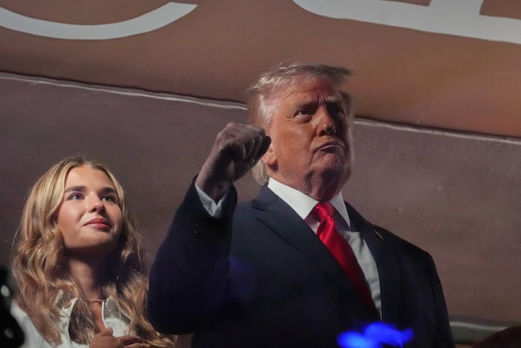 President Donald Trump gestures during the National Anthem before Game 3 of the NBA Finals between the San Antonio Spurs and New York Knicks on Monday at Madison Square Garden.