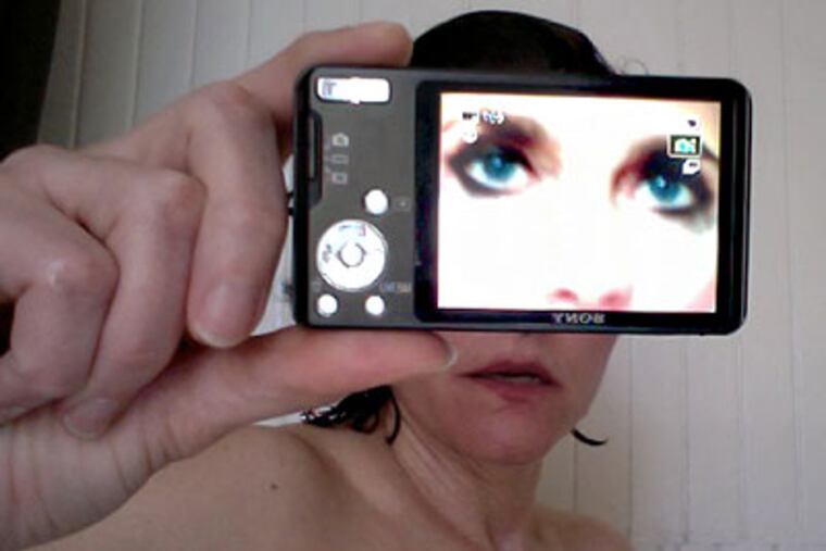 Fess Elliot in Whit MacLaughlin’s latest show, “Extremely Public Displays of Privacy.”