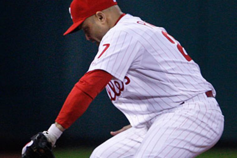 Placido Polanco's left elbow is still hurting a month after being hit by a pitch. (Ron Cortes/Staff Photographer)