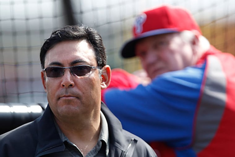 Phillies' GM Ruben Amaro Jr., left, and manager Charlie Manuel. (David Maialetti/Staff Photographer)