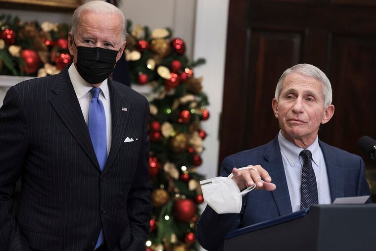 President Joe Biden (left) and his chief medical adviser Dr. Anthony Fauci (right) at the White House on Nov. 29.