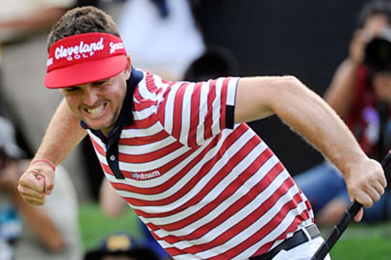 Keegan Bradley celebrates winning the Bridgestone Invitational tournament in Akron, Ohio. (Phil Long/AP)