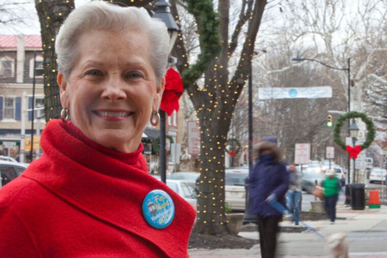 Haddonfield Mayor Tish Colombi with First Night buttons at the Haddonfield Information Center, December 27, 2012. ( DAVID M WARREN / Staff Photographer )