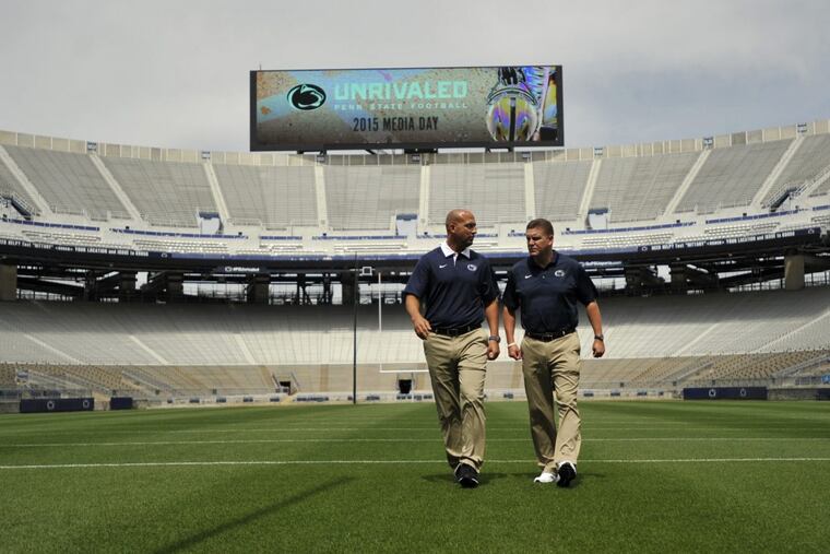 Penn State head coach James Franklin, left, talks to then defensive coordinator Bob Shoop during media day at Beaver Stadium in 2015.