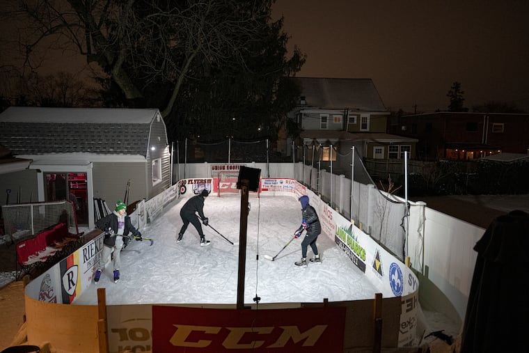 Family and friends skate at David Bara’s backyard ice rink in Northeast Philadelphia on Tuesday, Jan 21, 2025.