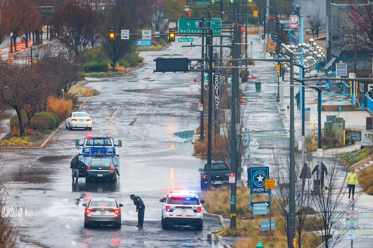 Flooding along Delaware Avenue near Race Street in Center City in December. The last few months have been extraordinarily wet, with more coming.