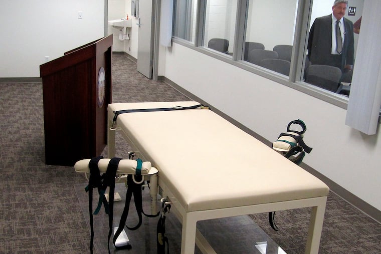 The execution chamber at the Idaho Maximum Security Institution is shown as Security Institution Warden Randy Blades look on in Boise, Idaho, in 2011.