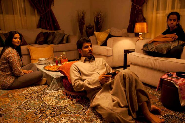 Reem Abdullah (left) , Sultan al Assaf and Waad Mohammed (right) star in "Wadjda," the first Saudi Arabian film made by a woman.