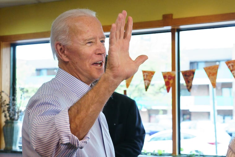 Joe Biden greets people at Gianni's Pizza in Wilmington in April on the day he announced his candidacy for president.