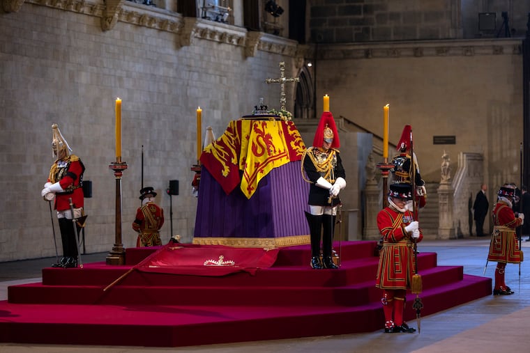 The coffin carrying Queen Elizabeth II rests in Westminster Hall for the lying in state.