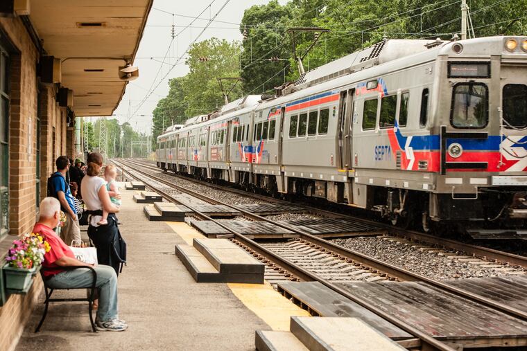 Commuters wait for a regional rail train in Ardmore.