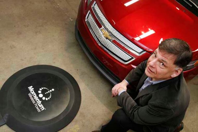 Andy Daga, founder and CEO of Momentum Dynamics a Malvern based company that is developing an electric car charging station that does not required connecting the vehicle to the electric service. Momentum Dynamics is located at 3 Pennsylvania Ave in Malvern, PA. Photograph from Tuesday, January 15, 2013. ( ALEJANDRO A. ALVAREZ / STAFF PHOTOGRAPHER )