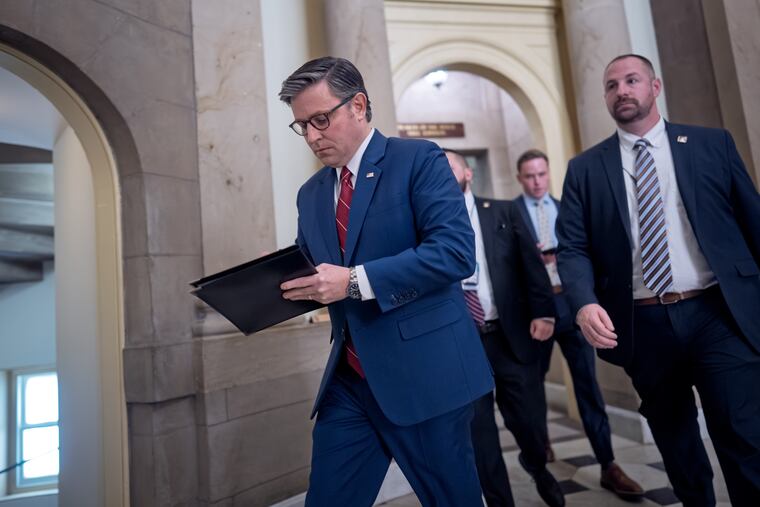 Speaker of the House Mike Johnson, R-La., heads from his office to the chamber for the final vote to bring the longest government shutdown in history to an end, at the Capitol in Washington, Wednesday, Nov. 12, 2025.
